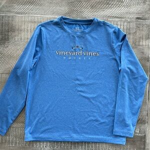 Like new! Vineyard Vines boy long sleeve shirt.
Performance fabric